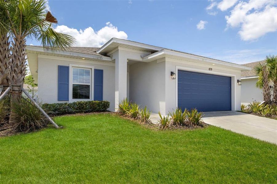 Front exterior of a new home in , Port Charlotte, FL, highlighting curb appeal (Image 22).