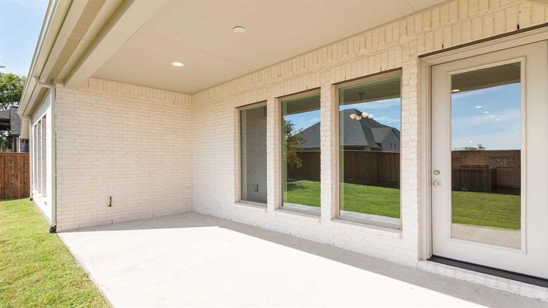 Exterior details and patio area of a home in Trinity Falls 50', McKinney (Image 3).