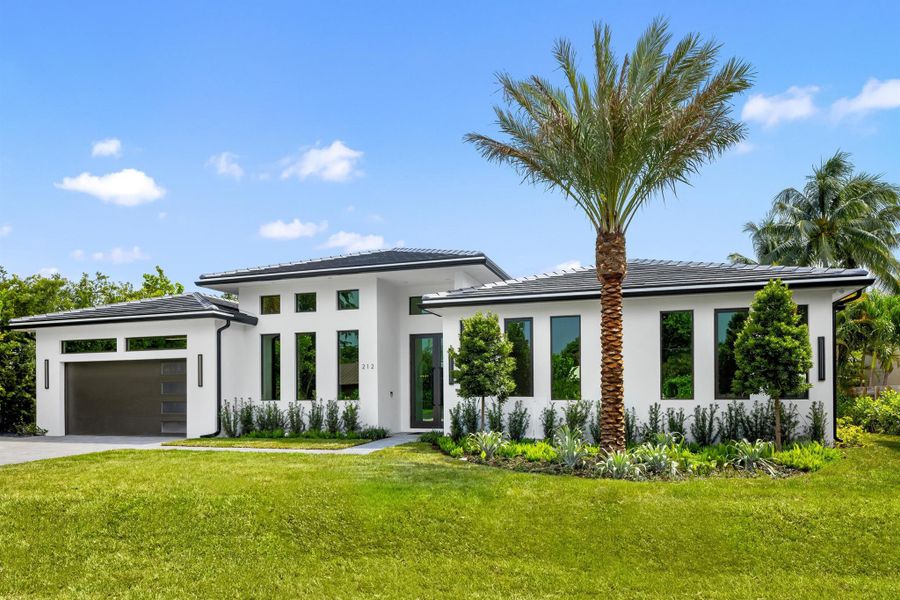 Front exterior of a new home in , Delray Beach, FL, highlighting curb appeal (Image 23).