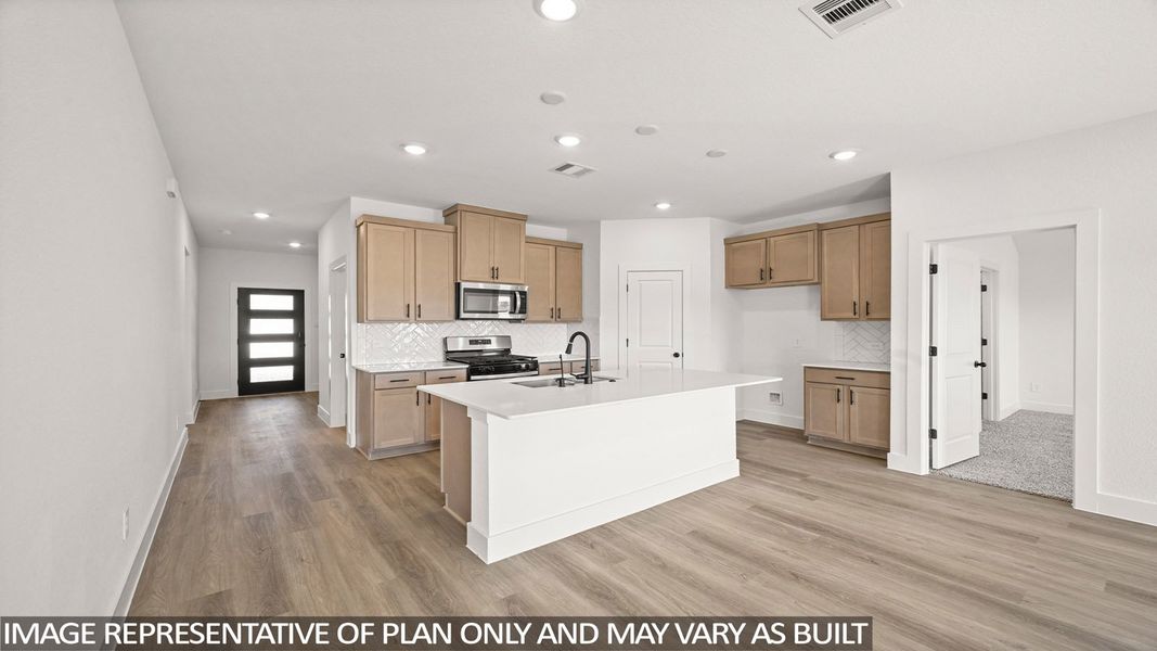 Furnished interior view inside a new home in Sunterra Lakes, Brookshire (Image 3). Furnished interior view inside a new home in Sunterra Lakes, Brookshire (Image 3).