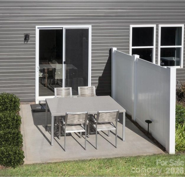 Exterior details and patio area of a home in Cheyney, Charlotte (Image 3).