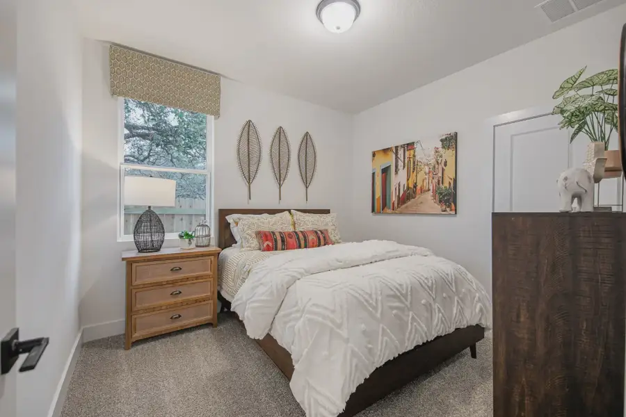 Representative furnished interior of a home built from the Athena by Chesmar Homes in Santa Rita Ranch, Liberty Hill (Image 10).