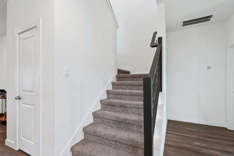 Head up the stairs to discover the rooms on the second floor.