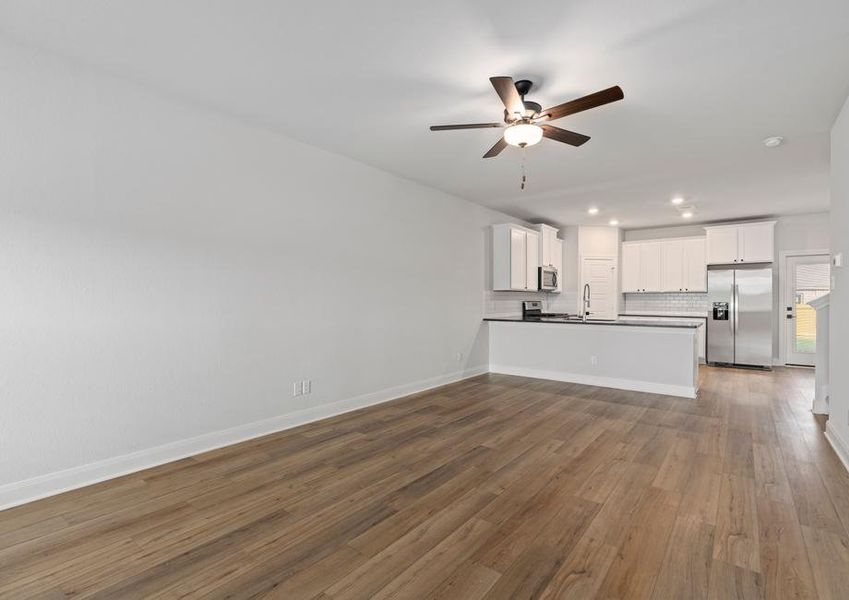 Open-concept layout with a spacious living room connected to the kitchen.