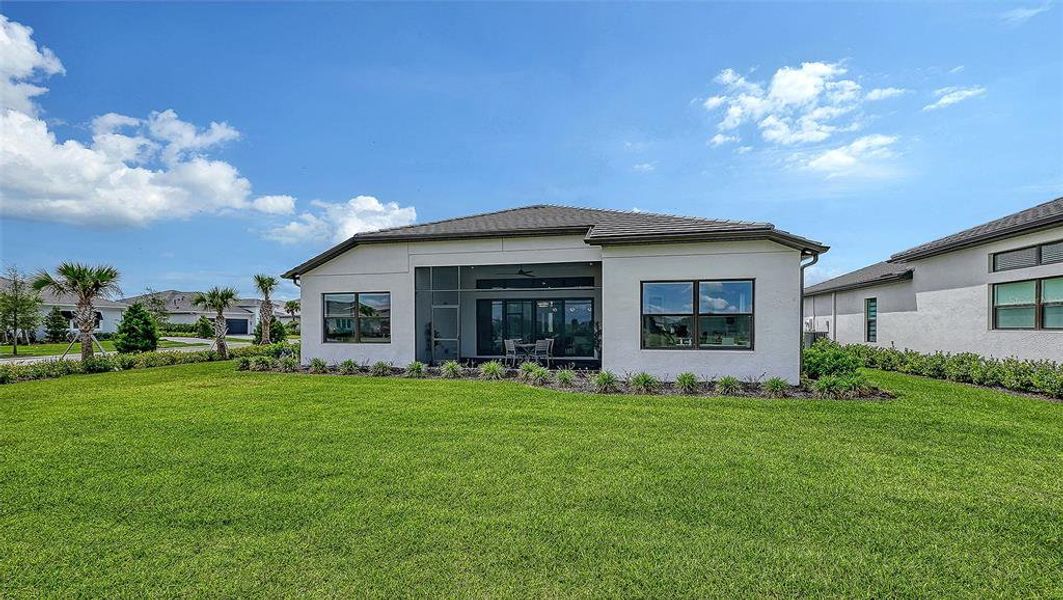 Exterior details and patio area of a home in , Sarasota (Image 34).