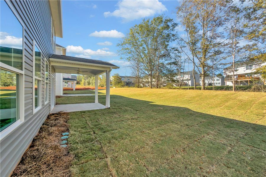 Exterior details and patio area of a home in Brownstone Park, Easley (Image 2). Exterior details and patio area of a home in Brownstone Park, Easley (Image 2).