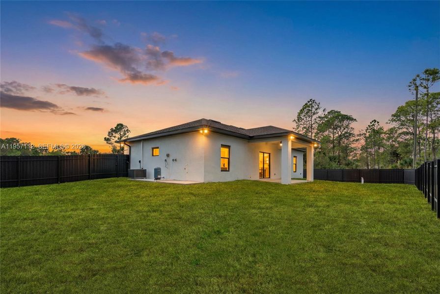 Exterior details and patio area of a home in , Lehigh Acres (Image 4).