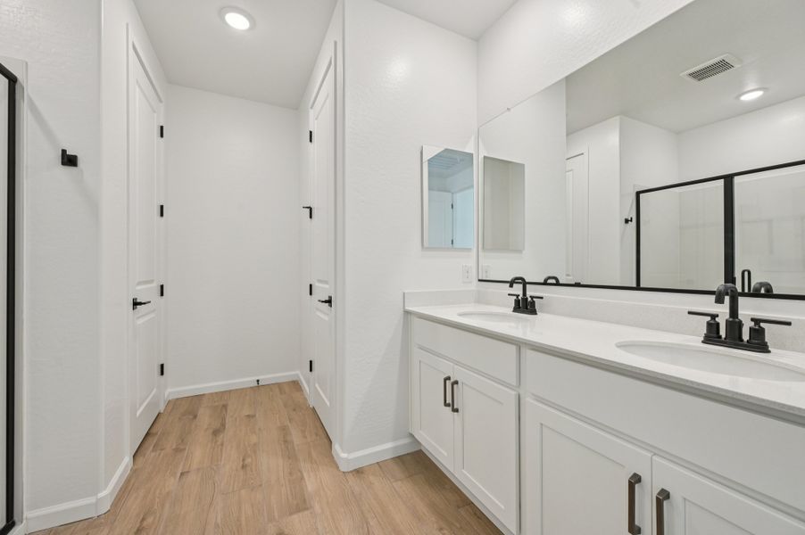 Primary bath. Finishes and options may vary by community.