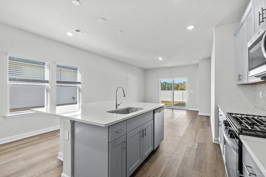 Furnished interior view inside a new home in Cypress Ridge - The Boardwalk Series, Longs (Image 12).