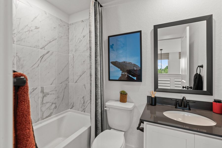 Furnished interior view inside a new home in The Crossvine – Garden Homes, Schertz (Image 26).