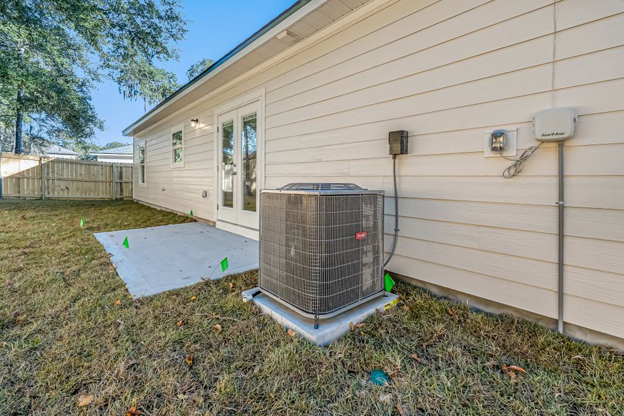 Exterior details and patio area of a home in Live Oak Cottages, Freeport (Image 27). Exterior details and patio area of a home in Live Oak Cottages, Freeport (Image 27).