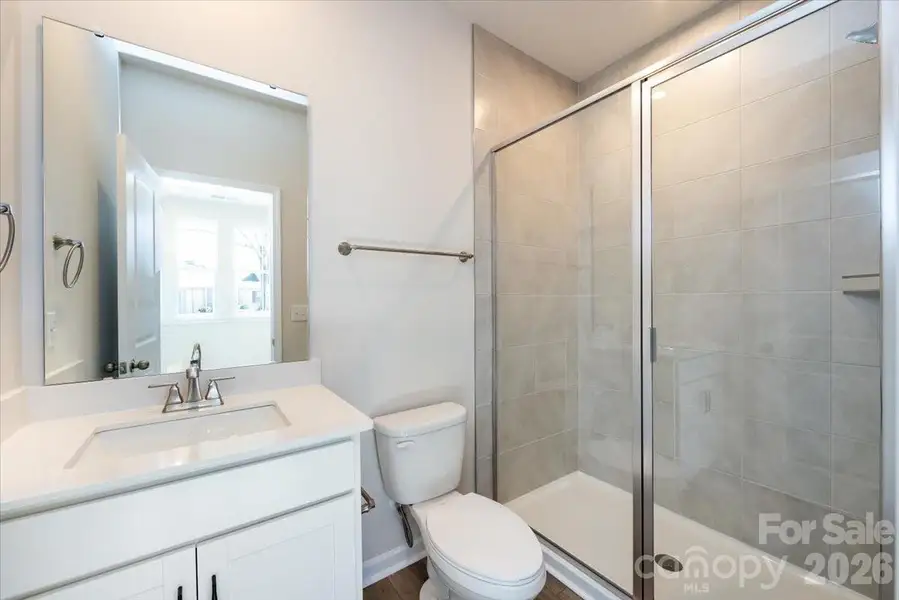 First Floor Full Bathroom with Walk-in Shower with Tiled Walls First Floor Full Bathroom with Walk-in Shower with Tiled Walls