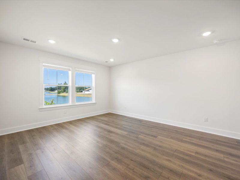 Spacious, unfurnished interior of a new home in The Coves at Lakes of Cane Bay, Summerville (Image 20). Spacious, unfurnished interior of a new home in The Coves at Lakes of Cane Bay, Summerville (Image 20).