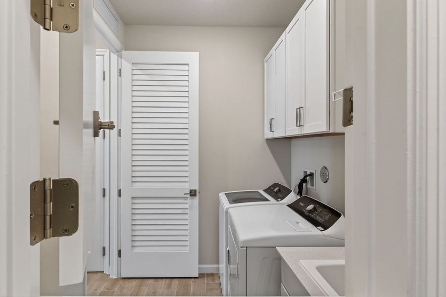 Furnished interior view inside a new home in Del Webb Tradition, Port St. Lucie (Image 37).