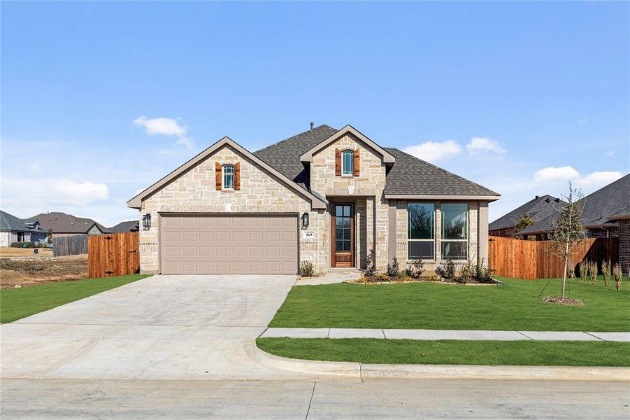 Front exterior of a new home in Sable Creek, Sanger, TX, highlighting curb appeal (Image 23).