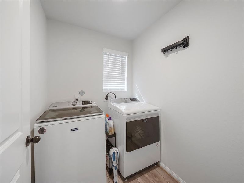 The utility room has space for extra cabinetry.