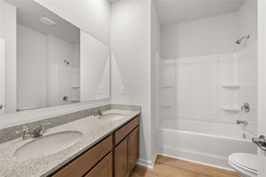 Furnished interior view inside a new home in Fairway 17 at Mirror Lake, Villa Rica (Image 5). Furnished interior view inside a new home in Fairway 17 at Mirror Lake, Villa Rica (Image 5).