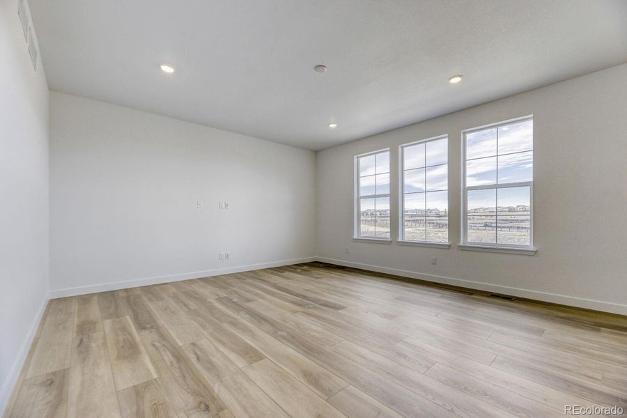 Spacious, unfurnished interior of a new home in Newlin Crossing, Parker (Image 18).
