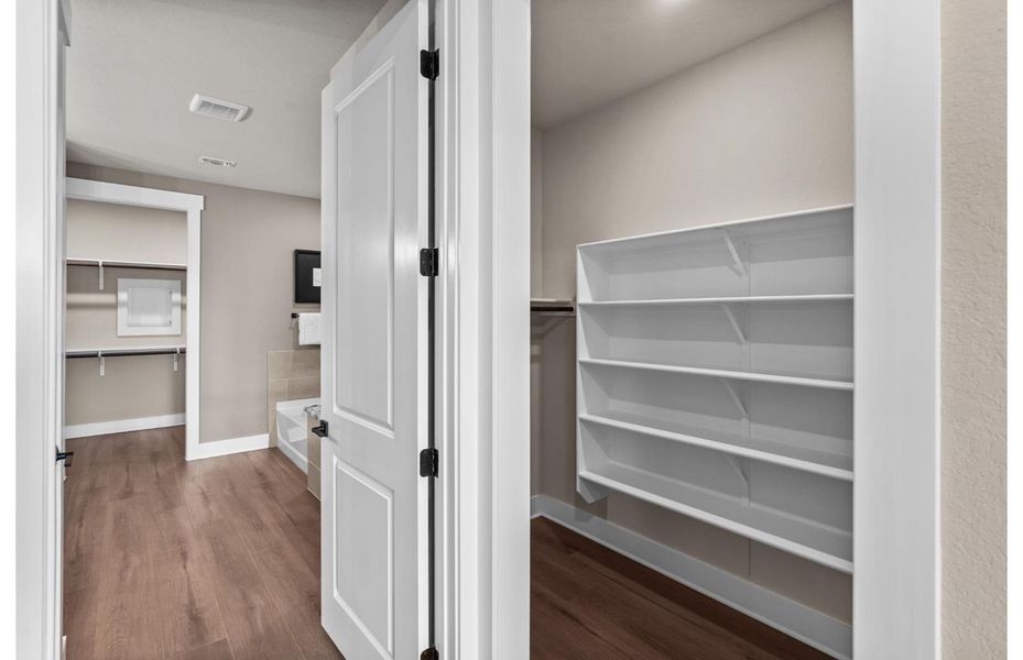 Owner's Walk-In Closet Owner's Walk-In Closet