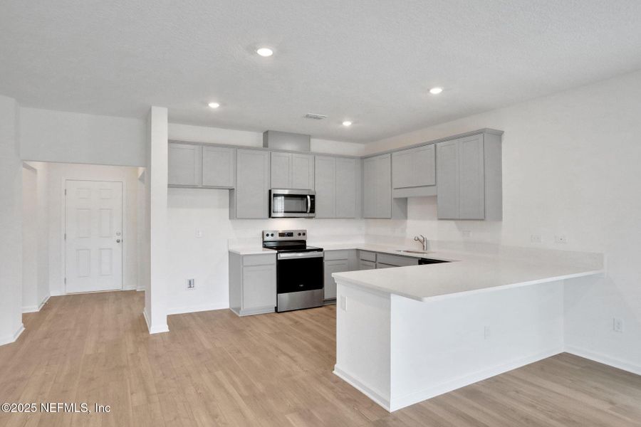 Furnished interior view inside a new home in Bellbrooke, Jacksonville (Image 7).