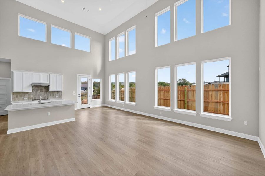 Spacious, unfurnished interior of a new home in Whisper Valley, Manor (Image 14).