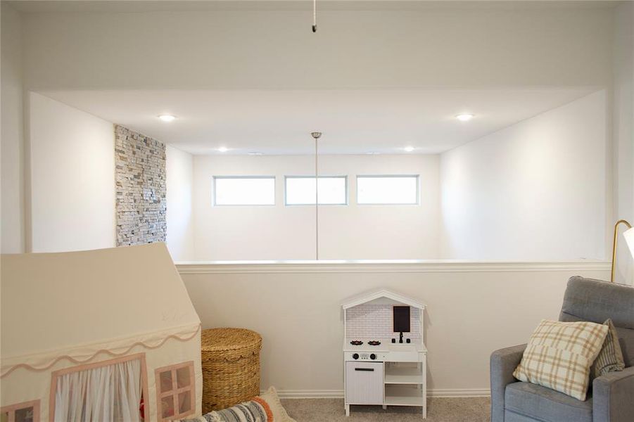 Furnished interior view inside a new home in , Little Elm (Image 9).