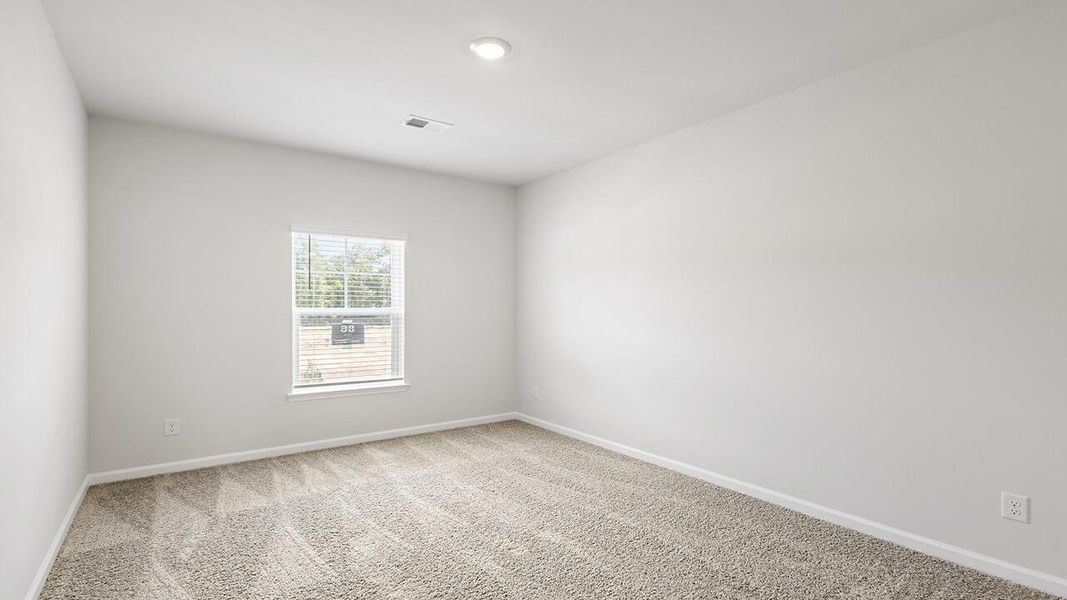 Spacious, unfurnished interior of a new home in The Crossing at St. James, Summerville (Image 23).