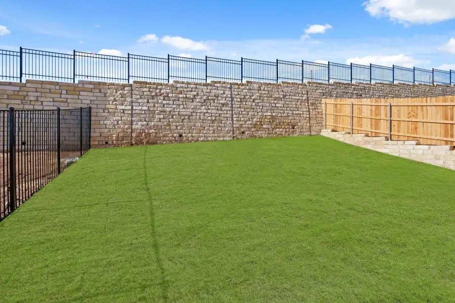 Yard in the Pecan II home plan by Trophy Signature Homes – REPRESENTATIVE PHOTO Yard in the Pecan II home plan by Trophy Signature Homes – REPRESENTATIVE PHOTO