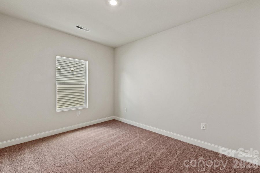 Spacious, unfurnished interior of a new home in Ascot Woods, Charlotte (Image 21).