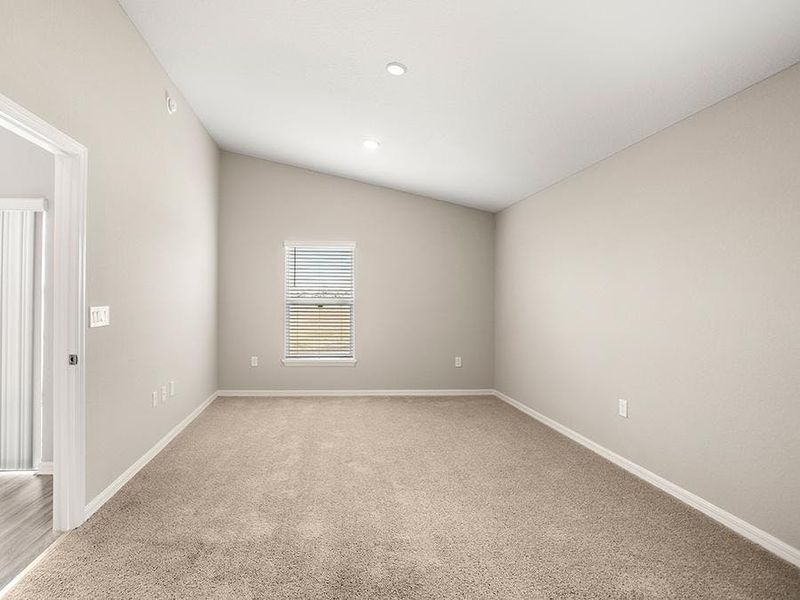 The owner`s suite includes volume ceilings and two walk-in closets - Sophia by Highland Homes