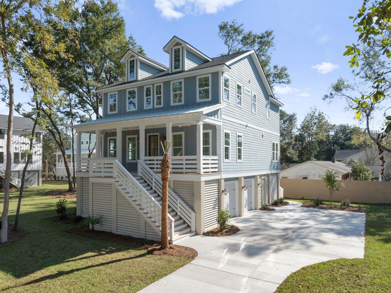 Front exterior of a new home in Ferryboat Landing, Charleston, SC, highlighting curb appeal (Image 20). Front exterior of a new home in Ferryboat Landing, Charleston, SC, highlighting curb appeal (Image 20).