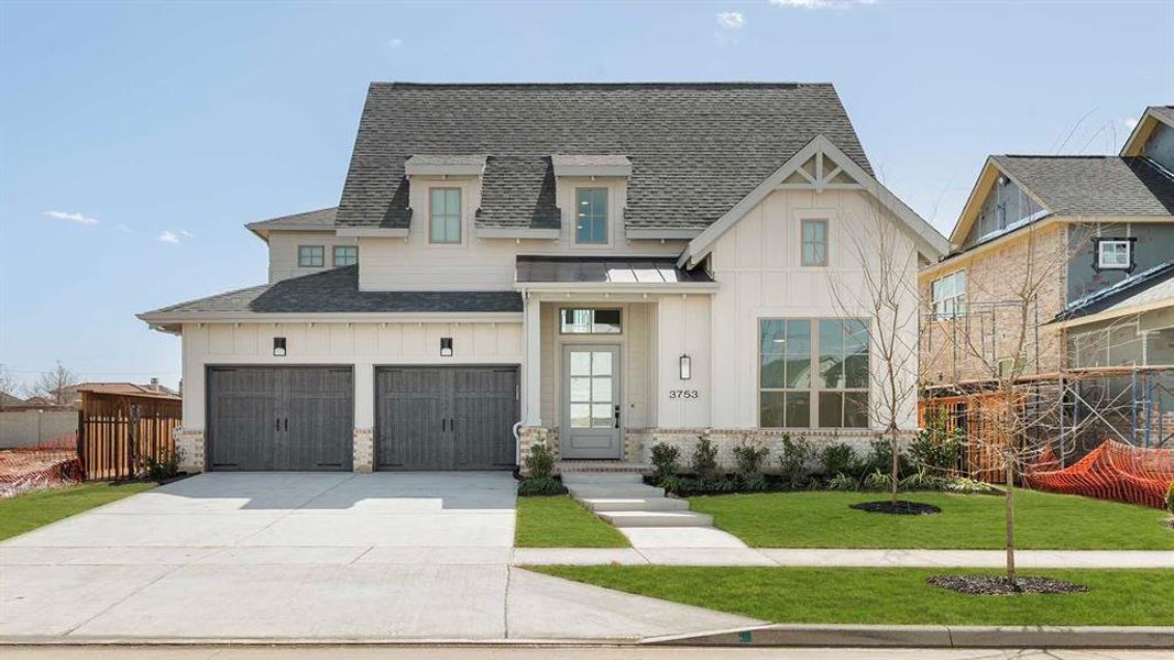 Front exterior of a new home in Fields 50', Frisco, TX, highlighting curb appeal (Image 20). Front exterior of a new home in Fields 50', Frisco, TX, highlighting curb appeal (Image 20).