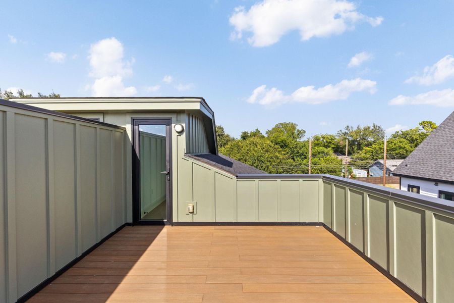 A spacious rooftop terrace provides an elevated outdoor living area with ample room for relaxation and entertainment.
