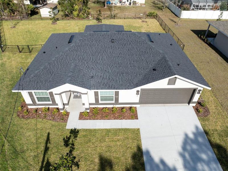 Front exterior of a new home in , Palm Coast, FL, highlighting curb appeal (Image 19).