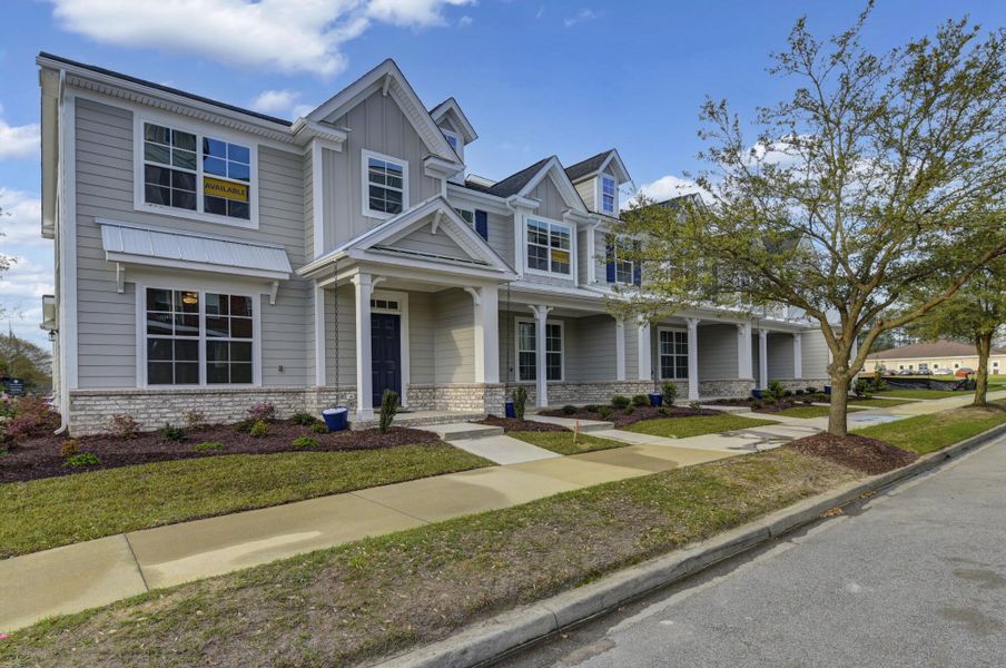 Front exterior of a new home in Lake Carolina Townhomes, Columbia, SC, highlighting curb appeal (Image 21).