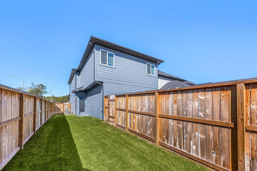 Exterior details and patio area of a home in , Humble (Image 26). Exterior details and patio area of a home in , Humble (Image 26).