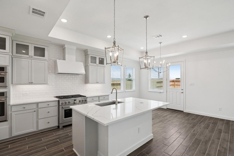 Kitchen open to great room and dining area Kitchen open to great room and dining area