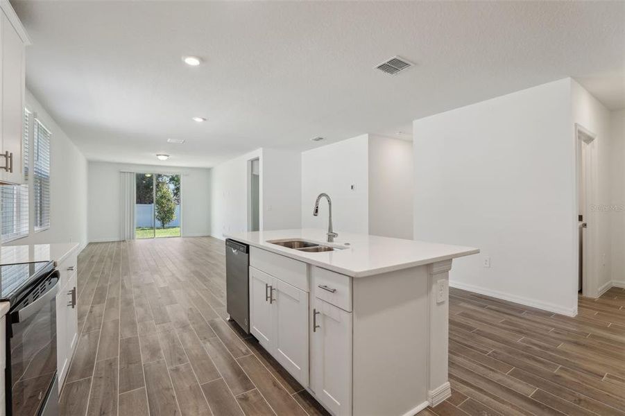Furnished interior view inside a new home in Lawson Dunes - Signature Series, Haines City (Image 6).