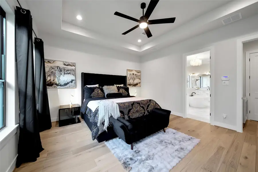 Furnished interior view inside a new home in ARTAVIA, Conroe (Image 16).