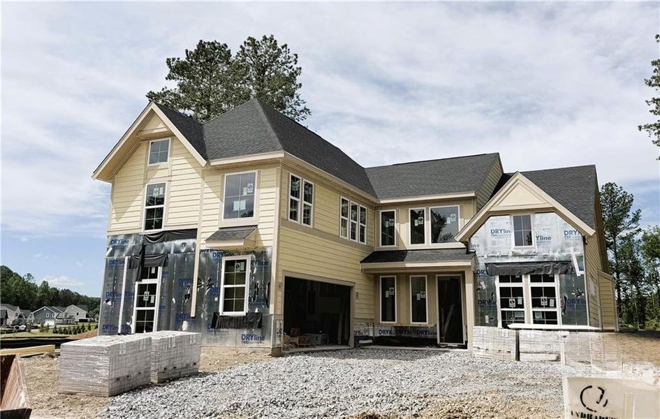 Front exterior of a new home in Governor’s Preserve, Canton, GA, highlighting curb appeal (Image 1). Front exterior of a new home in Governor’s Preserve, Canton, GA, highlighting curb appeal (Image 1).