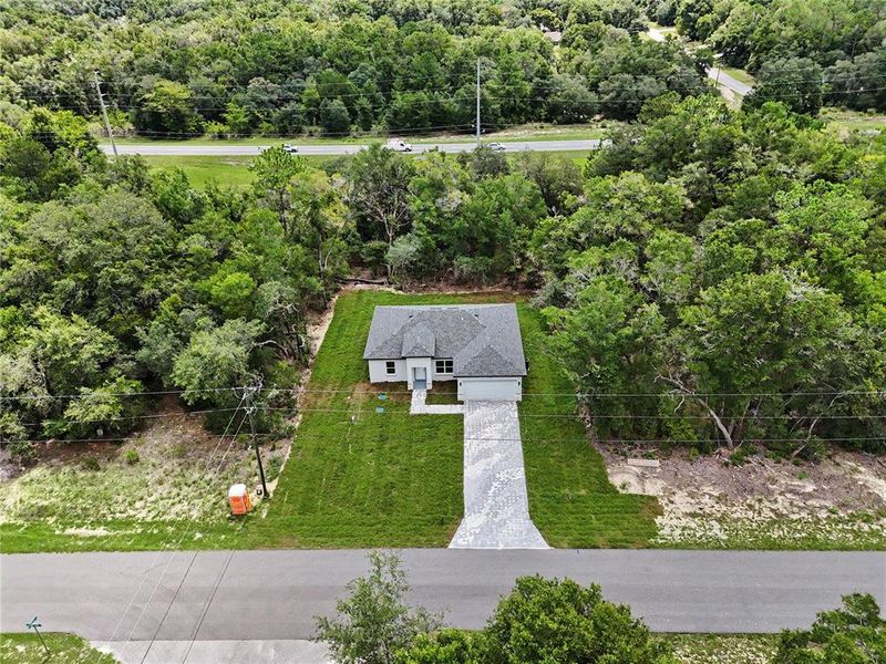 Front exterior of a new home in , Citrus Springs, FL, highlighting curb appeal (Image 20). Front exterior of a new home in , Citrus Springs, FL, highlighting curb appeal (Image 20).