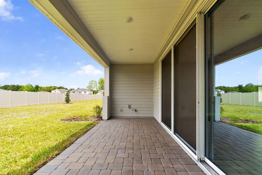 Exterior details and patio area of a home in Headwaters at Lofton Creek, Yulee (Image 3).