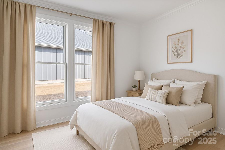 Virtually staged main level secondary bedroom