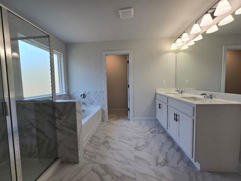 Furnished interior view inside a new home in Waters Edge, Mansfield (Image 10).