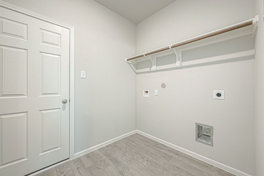 Representative unfurnished interior of a home built from the Floor Plan 2050 by Colina Homes in Grand Magnolia, Magnolia (Image 46).