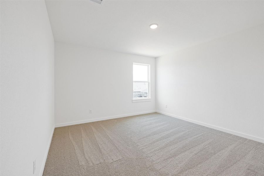 Spacious, unfurnished interior of a new home in Sunterra, Katy (Image 35).