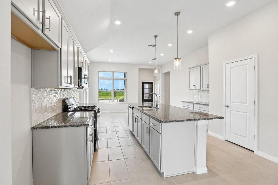 Furnished interior view inside a new home in Aldeana, Bonney (Image 14).