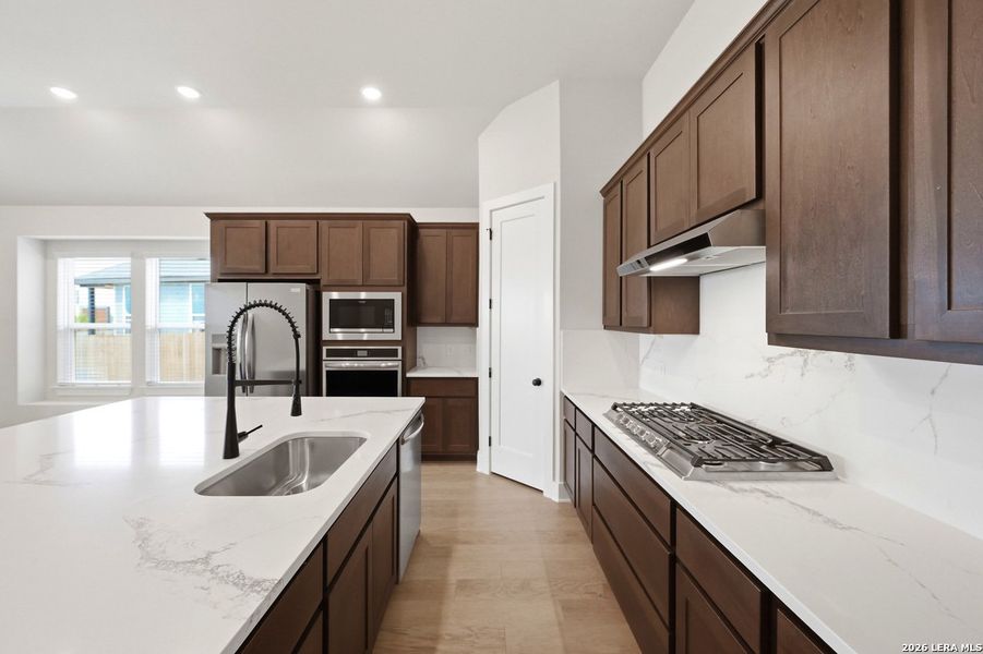 Furnished interior view inside a new home in Prominence, San Antonio (Image 13).