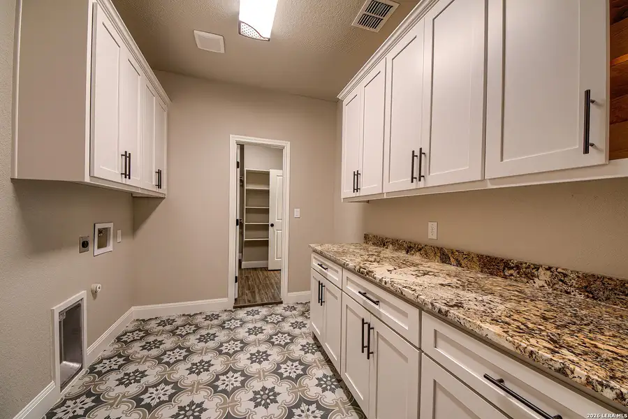 Furnished interior view inside a new home in , La Vernia (Image 15).