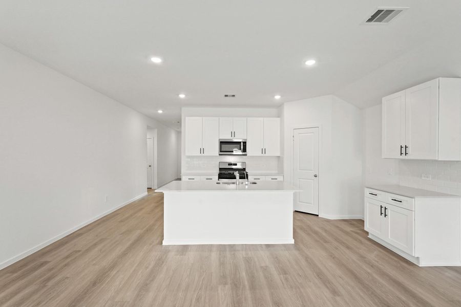 Furnished interior view inside a new home in Grand Pines, Magnolia (Image 3).